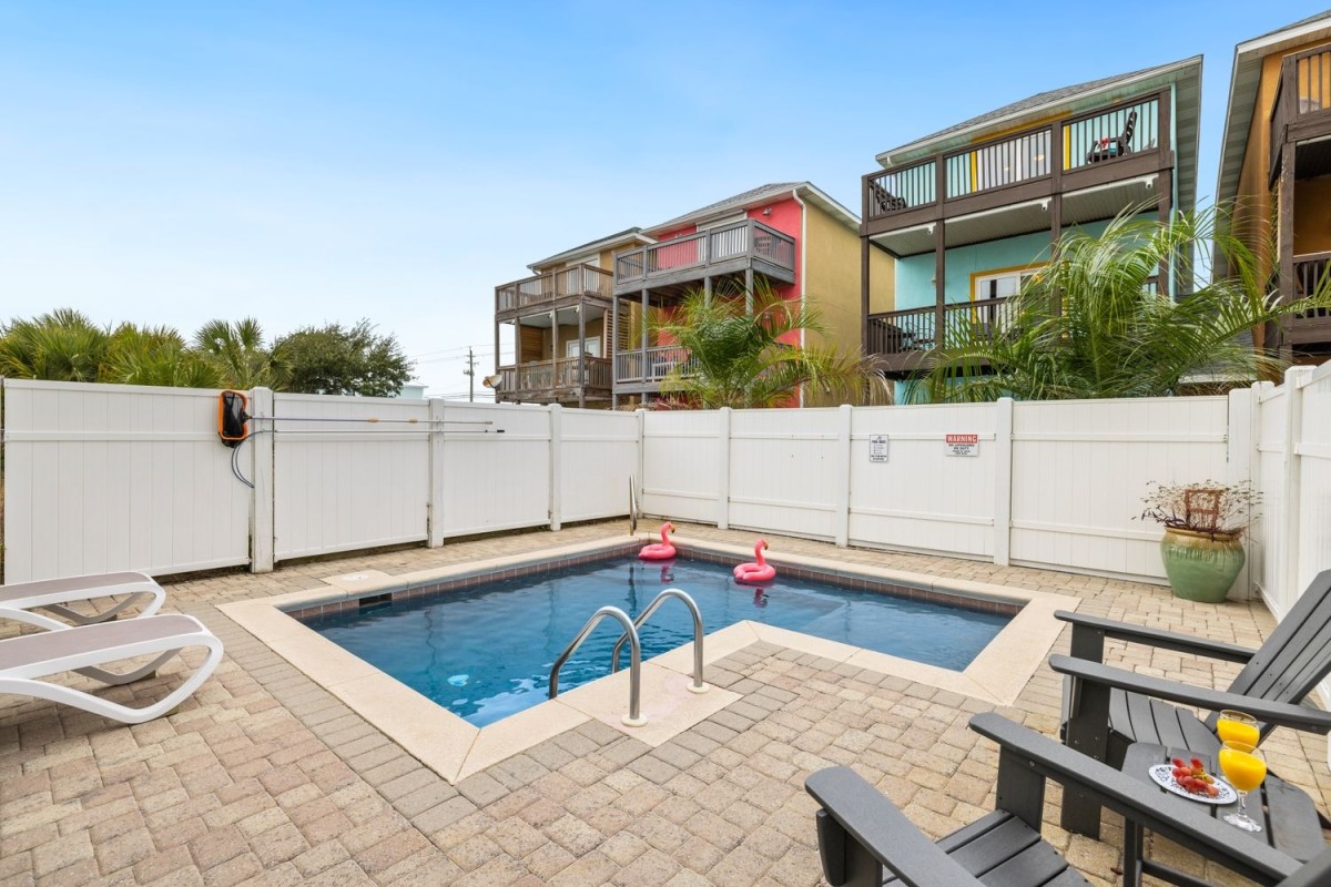 Zelie Beach Paradise House is located on the east end of PCB, sleeps 12 and offers 3 bedrooms w/ a loft. 3.5 Baths and a heated private pool.
